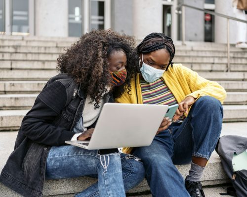 Cool Afro Girls Using Laptop