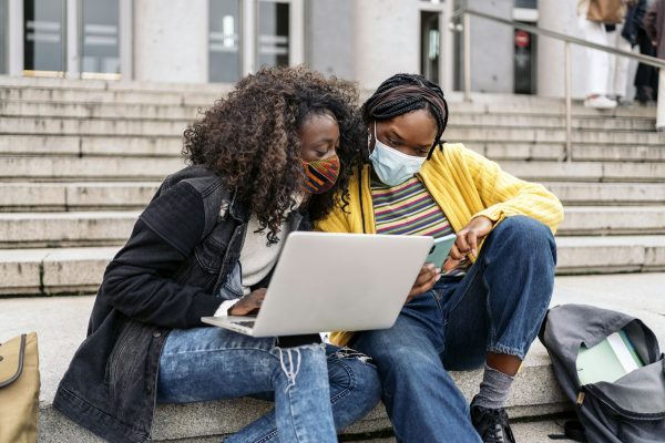 Cool Afro Girls Using Laptop